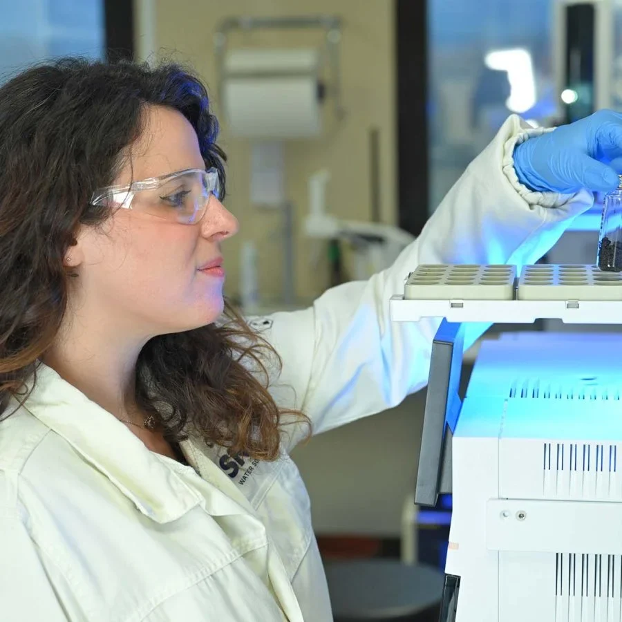 SNF Mining laboratory expert conducting process testing for mining applications.