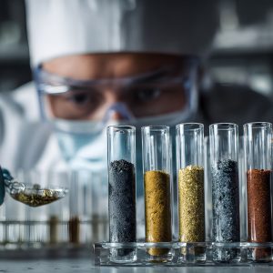 Mining innovation laboratory testing mineral samples in glass tubes for process optimization.