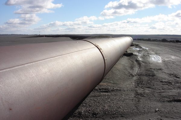 Mining slurry transport pipeline illustrating rheology control in high-solids operations.