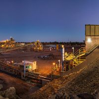 Iron ore processing plant with crushing and agglomeration facilities for pellet and sinter production