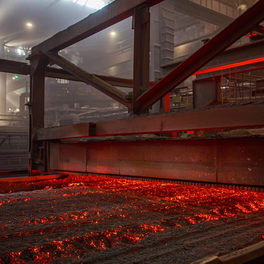 Iron ore sinter bed in agglomeration plant improving permeability and fuel efficiency