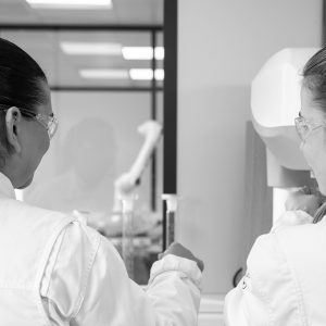 SNF Mining experts reviewing performance data on-site, illustrating a 360° approach to mining operational improvement.