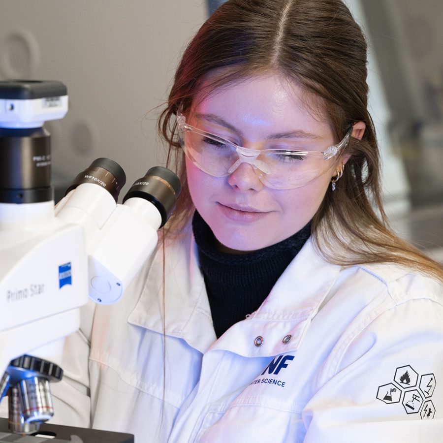 SNF Mining researcher conducting laboratory analysis for mining water chemistry and process development.