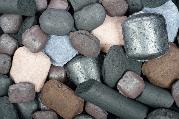 Pelletized and briquetted iron materials for blast furnace and direct reduction routes.